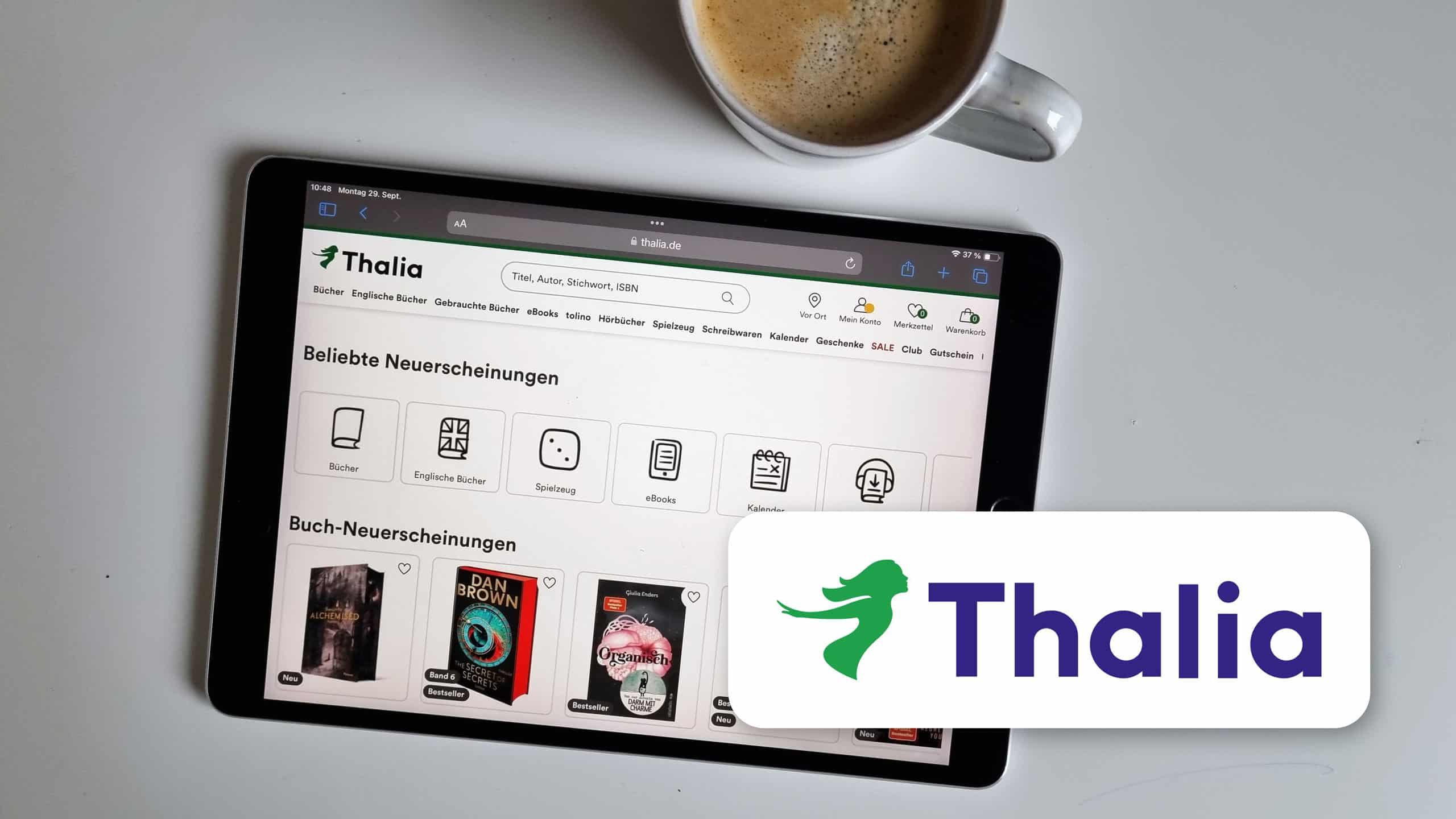 Foto van een iPad met de Thalia-website. Het Thalia-logo is op de voorgrond te zien.